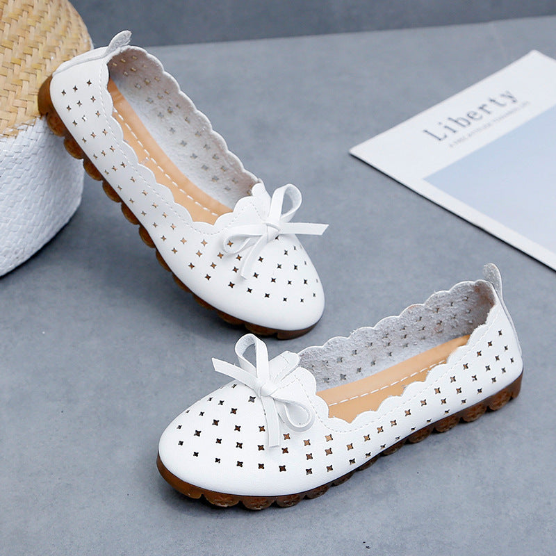 Mocasines con tacón bajo y agujeros